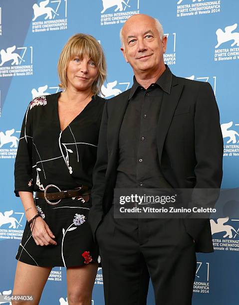 Editor Cristina Sardo and director Davide Ferrario attends the 'La Zuppa Del Demonio' - Photocall during the 71st Venice Film Festival on September...