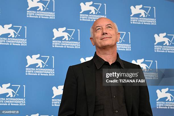 Italian director Davide Ferrario poses during the photocall of the movie "La Zuppa del Demonio" presented out of competition at the 71st Venice Film...