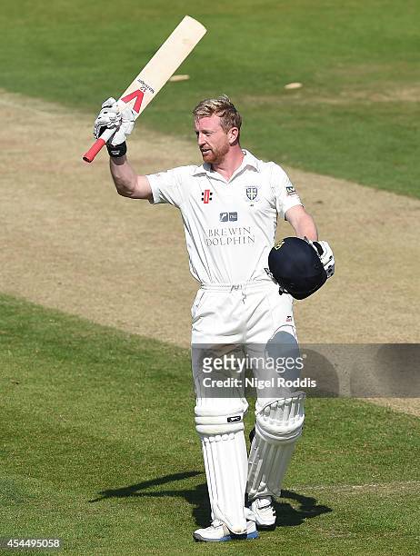 Paul Collingwood of Durham celebrates hitting a century during the LV County Championship match between Durham and Nottinghamshire at The Riverside...