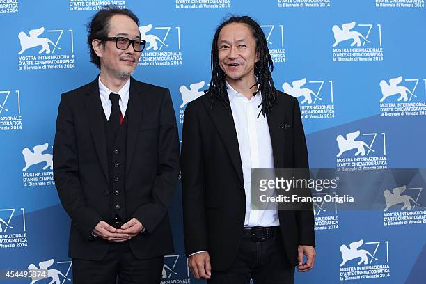 Actor Lily Franky and actor Tatsuya Nakamura attend the 'Fires On The Plain' Photocall during the 71st Venice Film Festival on September 2, 2014 in...