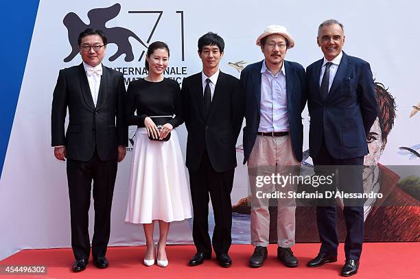 Actors Kim Euisung, Moon Sori, Ryo Kase, director Hong Sangsoo and director of the Venice Film Festival Alberto Barbera attend the 'Hill Of Freedom'...