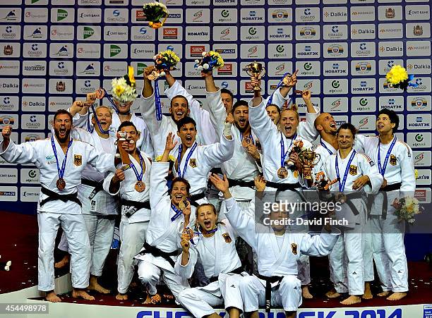 The bronze medal winning German Men and Women's teams Rene Schneider, Sebastian Seidl, Christopher Voelk, Sven Maresch, Marc Odenthal, Dimitri...