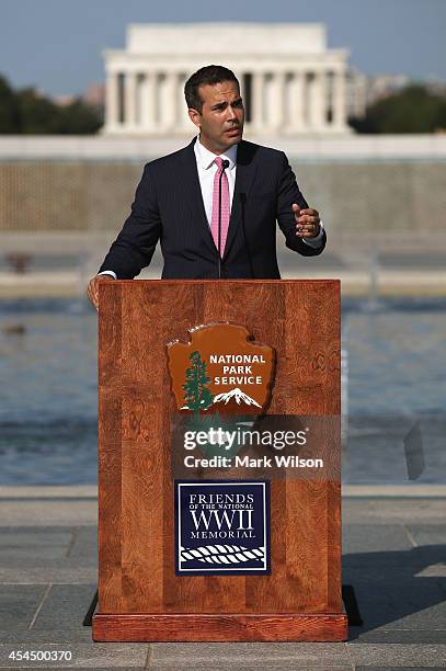 George Prescott Bush, grandson of President George H.W. Bush, speaks during a ceremony at the World War II Memorial, September 2, 2014 in Washington,...