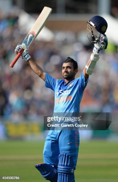 Ajinkya Rahane of India celebrates reaching his century during the 4th Royal London One Day International match between England and India at...