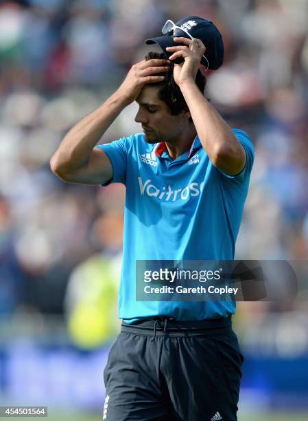 England captain Alastair Cook leaves the field after losing the 4th Royal London One Day International match between England and India at Edgbaston...