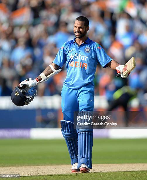 Shikhar Dhawan of India celebrates hitting the winning runs during the 4th Royal London One Day International match between England and India at...
