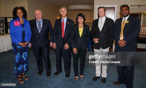Mayoral candidates L-R Dionne Renee, Rob Ford, David Soknacki, Olivia Chow, John Tory, and Dewitt Lee pose for a picture before the Black Canadian...