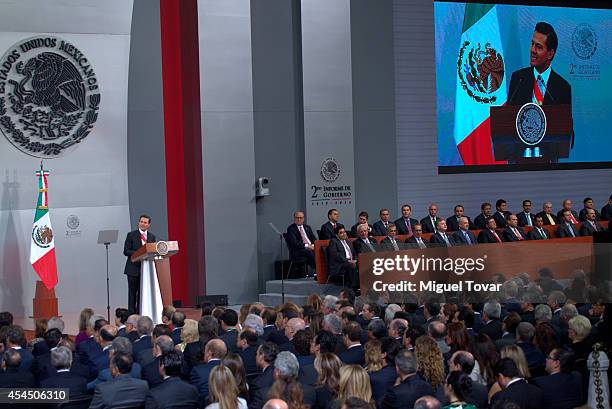Mexican president Enrique Peña Nieto speaks during the Presentation Of Second Annual Report of Mexican Federal Government at National Palace on...