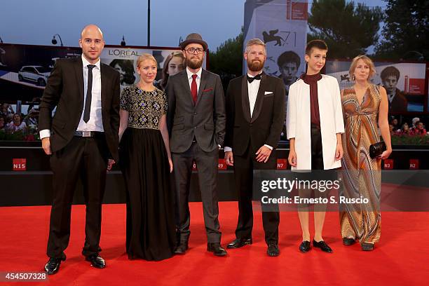 Guests attends the 'A Pigeon Sat On A Branch Reflecting On Existence' - Premiere during the 71st Venice Film Festival on September 2, 2014 in Venice,...