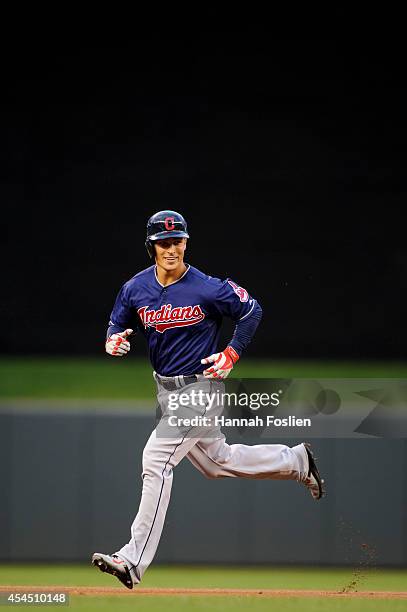 NMINNEAPOLIS, MN Zach Walters of the Cleveland Indians rounds the bases after hitting a home run against the Minnesota Twins during the game on...