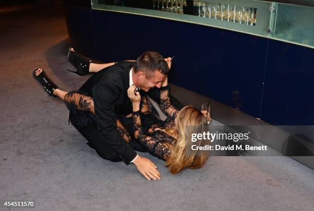 Jonathan Saunders and Cara Delevingne attend the GQ Men Of The Year awards in association with Hugo Boss at The Royal Opera House on September 2,...