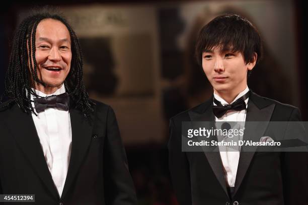 Actors Tatsuya Nakamura and Yusaku Mori attends the 'Fires On The Plain' Premiere during the 71st Venice Film Festival on September 2, 2014 in...