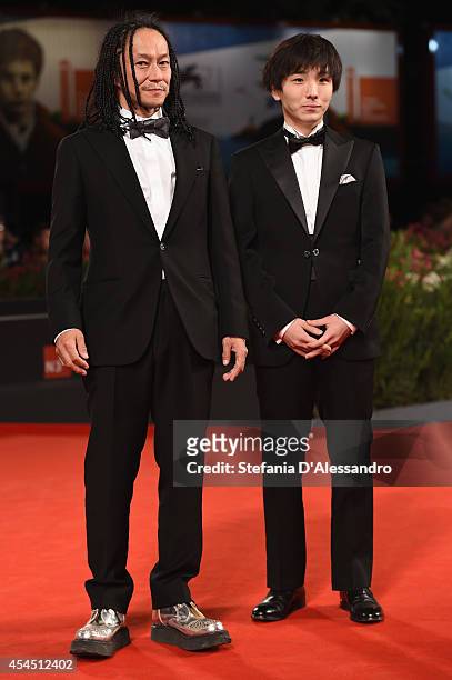Actors Tatsuya Nakamura and Yusaku Mori attends the 'Fires On The Plain' Premiere during the 71st Venice Film Festival on September 2, 2014 in...