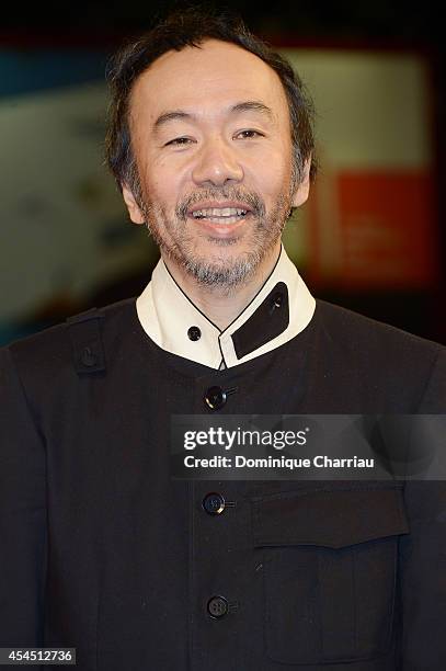 Director Shinya Tsukamoto attends the 'Fires On The Plain' premiere during the 71st Venice Film Festival at Sala Grande on September 2, 2014 in...