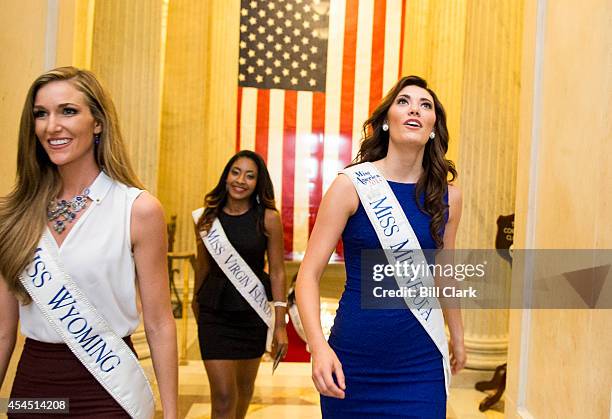 Miss America pageant contestants, form left, Miss Wyoming Jessie Allen, Miss Virgin Islands Ashley Richelle Gabriel, and Miss Minnesota Savannah Cole...