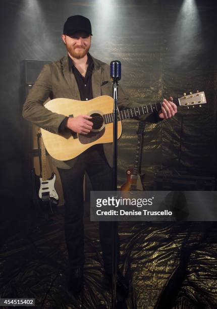 Singer Eric Paslay poses for a portrait at the Academy of Country Music Awards for People Magazine on April 6, 2014 in Las Vegas, Nevada.