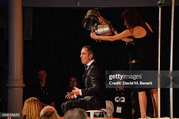 Host James Nesbitt takes the ALS Ice Bucket Challenge at the GQ Men Of The Year awards in association with Hugo Boss at The Royal Opera House on...