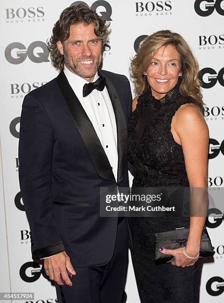 Melanie Bishop and John Bishop attend the GQ Men of the Year awards at The Royal Opera House on September 2, 2014 in London, England.