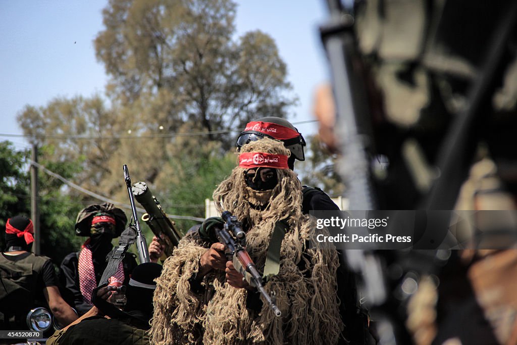 Face covered militants from the Popular Front for the...