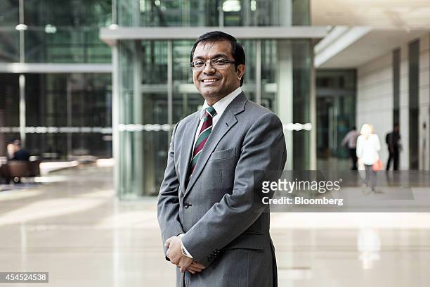 Badlisyah Abdul Ghani, chief executive officer of CIMB Islamic Banking Bhd., stands for a photograph before a Bloomberg Television interview at the...