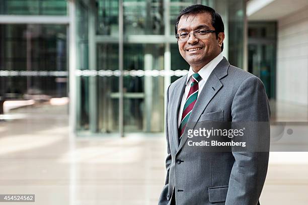 Badlisyah Abdul Ghani, chief executive officer of CIMB Islamic Banking Bhd., stands for a photograph before a Bloomberg Television interview at the...