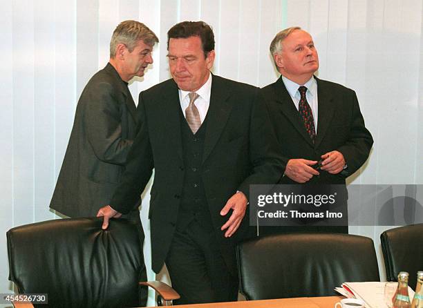Joschka Fischer, member of the Green Party, Oskar Lafontaine, member of the SPD and Gerhard Schroeder, member of the SPD coming together for...