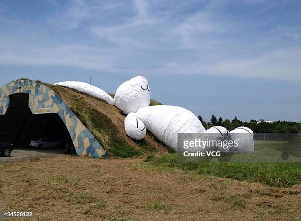 Giant rabbit" created by Florentijn Hofman, is on display on September 2, 2014 in Taipei, Taiwan of China. Florentijn Hofman, creator of the yellow...