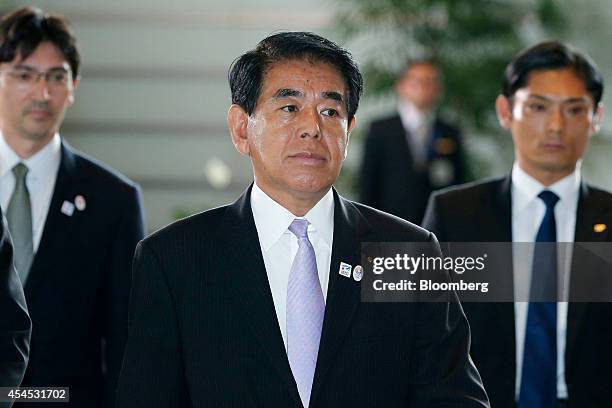 Hakubun Shimomura, Japan's re-appointed education minister, arrives at the prime minister's official residence in Tokyo, Japan, on Wednesday, Sept....