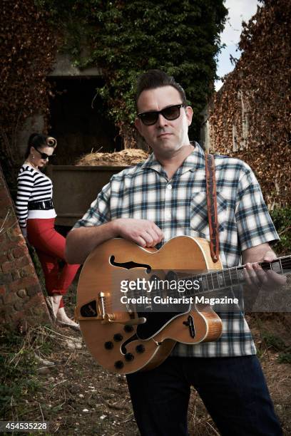 Portrait of husband and wife rock musicians Darrel Higham and Imelda May photographed at their home in Reading, England, on August 6, 2013.