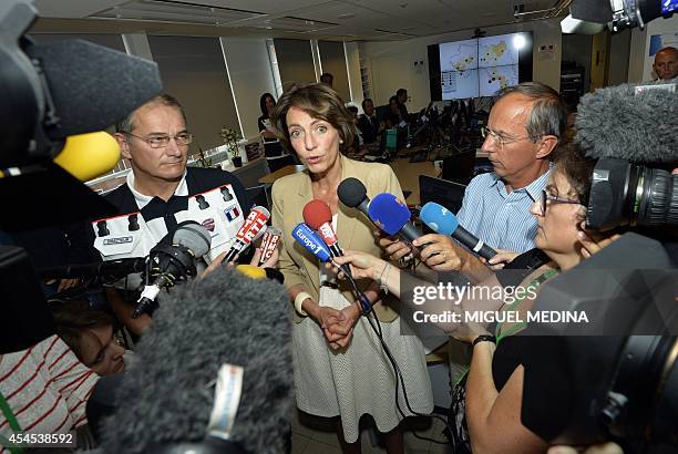 French Social Affairs and Health Minister Marisol Touraine speaks to the press on September 3, 2014 in Paris after a meeting with health workers,...