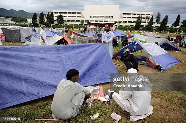 Pakistani anti-government protestors keep waiting at the parliament garden during the ongoing protests in Islamabad, Pakistan on September 3, 2014....