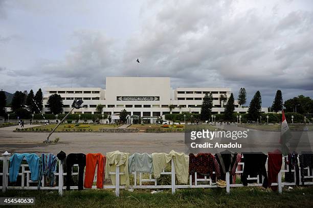 Pakistani anti-government protestors keep waiting at the parliament garden during the ongoing protests in Islamabad, Pakistan on September 3, 2014....