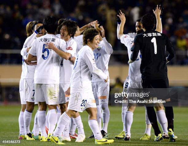 Tokushima Voltis players celebrate their promotion to the J.League top division after the J.League Play-Off final match between Kyoto Sanga and...