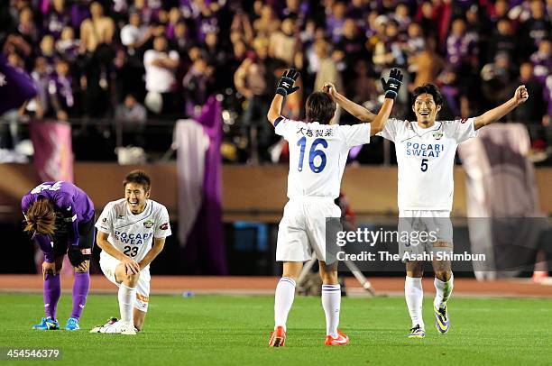Tokushima Voltis players celebrate their promotion to the J.League top division after the J.League Play-Off final match between Kyoto Sanga and...