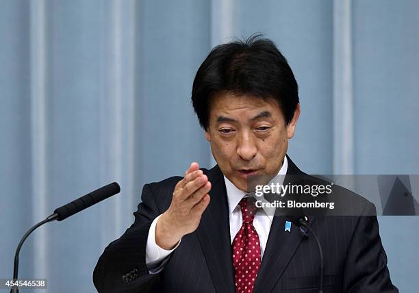 Yasuhisa Shiozaki, Japan's newly appointed health, labor and welfare minister, speaks during a news conference at the prime minister's official...