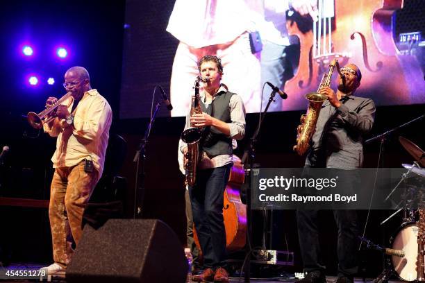 Musicians Terence Blanchard, Brice Winston and Ravi Coltrane performs during the 36th Annual Chicago Jazz Festival at Millennium Park on August 29,...