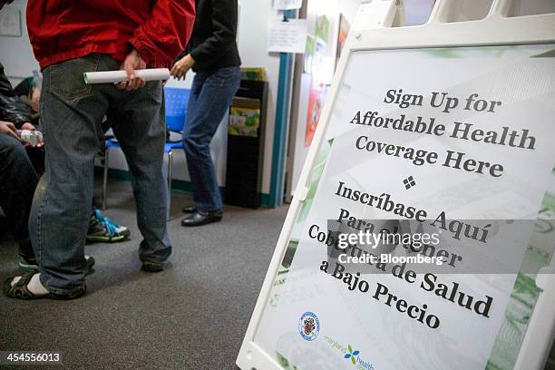 An affordable health coverage sign stands a health insurance education and enrollment event in Silver Spring, Maryland, U.S., on Saturday, Dec. 7,...