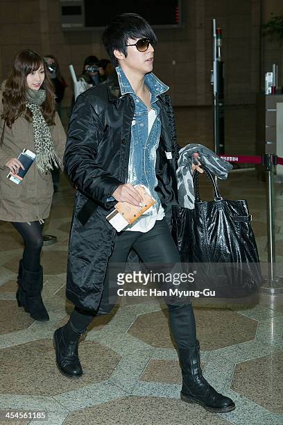Son Dong-Woon of South Korean boy band Beast is seen on departure at Gimpo International Airport on December 9, 2013 in Seoul, South Korea.