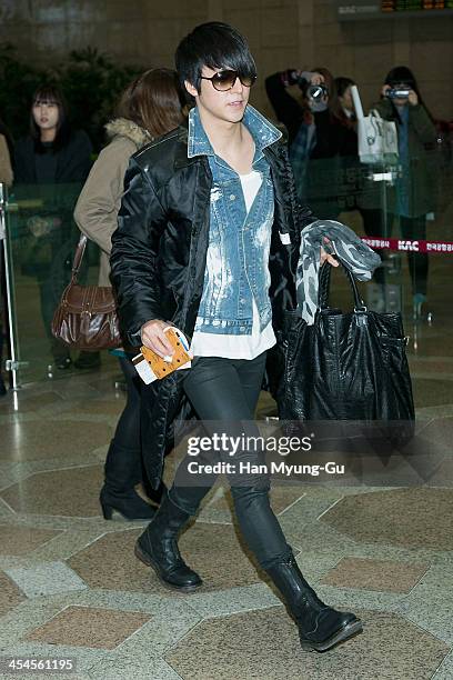 Son Dong-Woon of South Korean boy band Beast is seen on departure at Gimpo International Airport on December 9, 2013 in Seoul, South Korea.