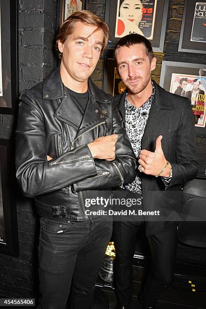 Pelle Almqvist and Miles Kane attend as John Varvatos launch their first European store in London, on September 3, 2014 in London, England.