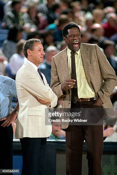 Sacramento Kings head coach Bill Russell smiles with Lenny Wilkens during a game against the Boston Celtics on January 27, 1987 at Arco Arena in...