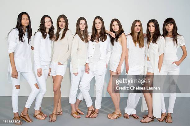 Models pose during the Frame Denim presentation on September 3, 2014 in New York City.