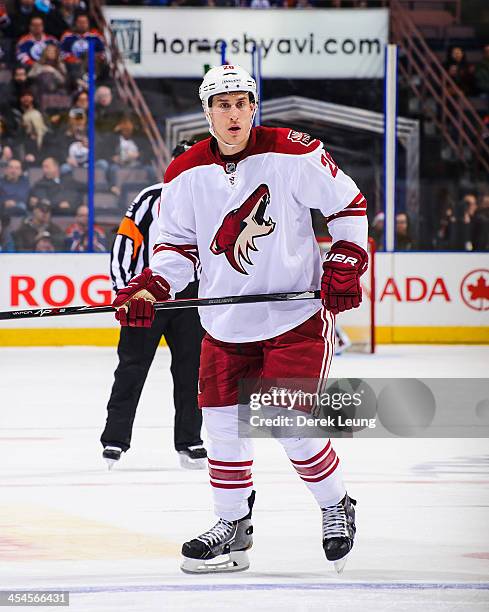 Michael Stone of the Phoenix Coyotes skates against the Edmonton Oilers during an NHL game at Rexall Place on December 3, 2013 in Edmonton, Alberta,...