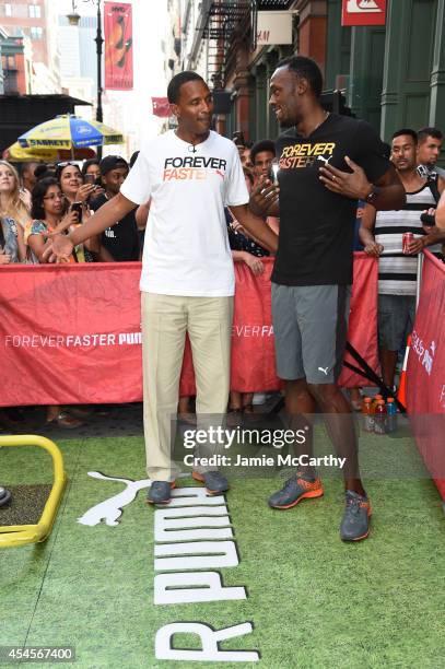 Usain Bolt and Shaka Hislop attend The PUMA Store Soho Training Event on September 3, 2014 in New York City.