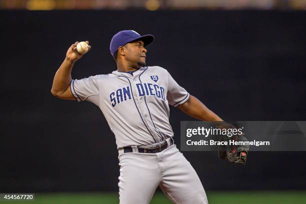 Chris Nelson of the San Diego Padres throws against the Minnesota Twins on August 5, 2014 at Target Field in Minneapolis, Minnesota. The Twins...