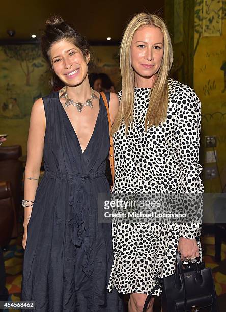 Jewelry designers Pamela Love and Jennifer Fisher attend the New York Times Vanessa Friedman and Alexandra Jacobs welcome party on September 3, 2014...