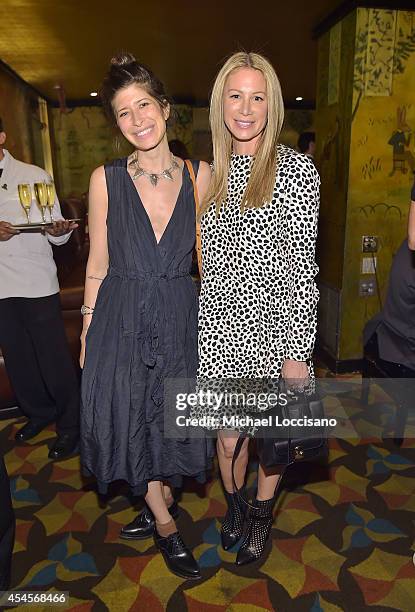 Jewelry designers Pamela Love and Jennifer Fisher attend the New York Times Vanessa Friedman and Alexandra Jacobs welcome party on September 3, 2014...