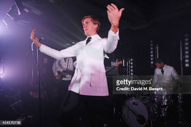 Pelle Almqvist of The Hives performs as John Varvatos launch their first European store in London, on September 3, 2014 in London, England.