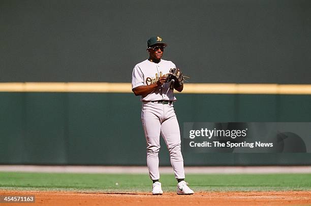 Miguel Tejada of the Oakland Athletics fields during the game against the Seattle Mariners on September 24, 2000 at Safeco Field in Seattle,...