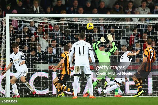 Chico Flores of Swansea City scores his sides equalising goal during the Barclays Premier League match between Swansea City and Hull City at the...